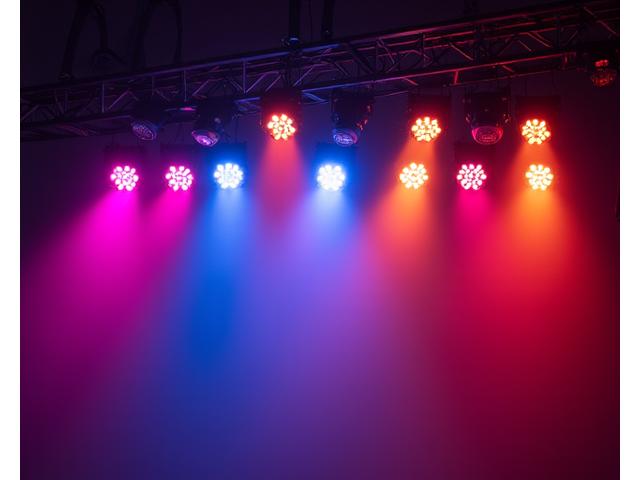Array of vibrant, modern LED wash lights and moving head fixtures on a truss.
